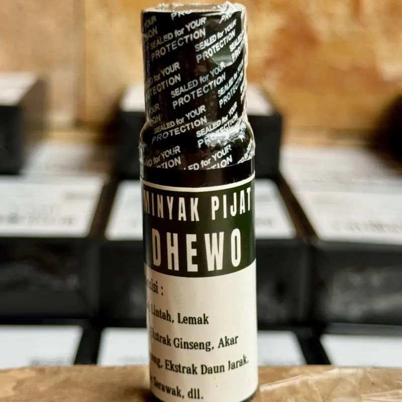 MINYAK PIJAT TRADISIONAL MASSAGE OIL DHEWO 30ML