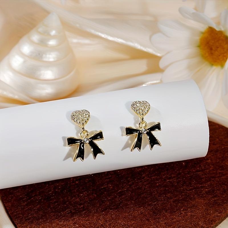 Product Introduction of Shiny Heart With Black Bow Pendant Stud Earrings Alloy Jewelry Embellished With Rhinestones Elegant Vintage Style Female Dating Earrings 2