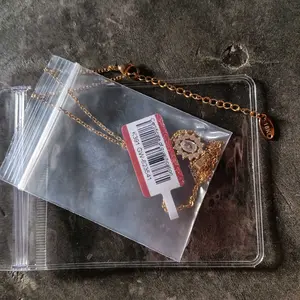 Visimary • Ibtihaj Rahma Kalung Liontin Bunga Matahari Permata Merah / Putih Titanium - Perhiasan Wanita Korean Style - Anti Karat Tidak Luntur