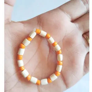 GELANG OTOK BAYI ATAU GELANG SAWAN BAYI MUTIARA WARNA OREN