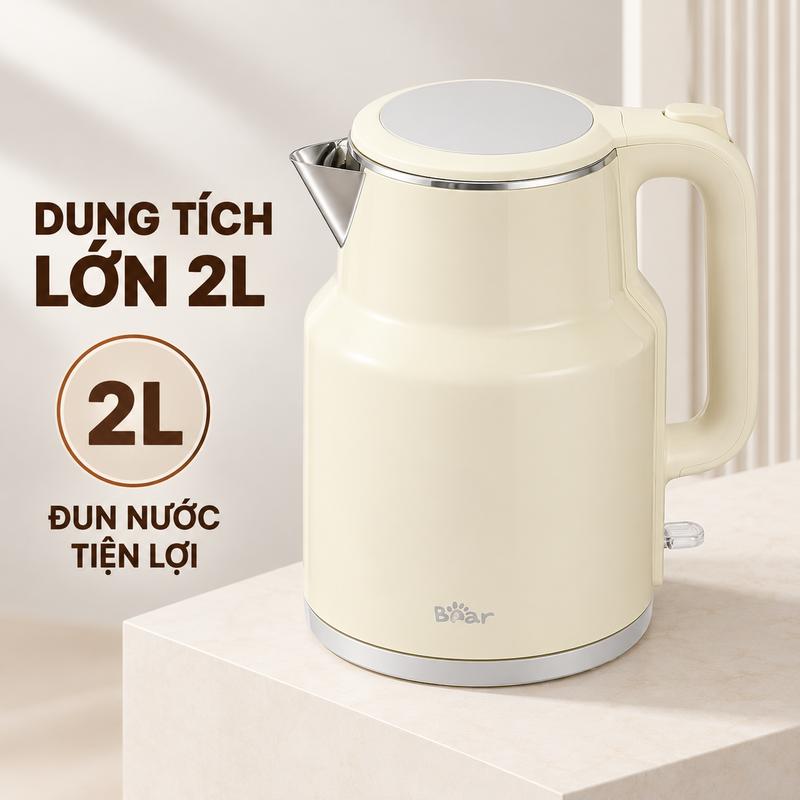 Ấm siêu tốc Bear KE-5H20B16 dung tích 2L, công suất 2100W, điện áp 220V~50Hz, màu kem hiện đại, tay cầm chắc chắn, nút mở nắp tiện lợi, đèn báo hoạt động dễ quan sát, phù hợp đun nước pha trà, cà phê, mì và sử dụng hằng ngày cho gia đình