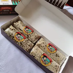 dodol wijen 4 lonjor kecil 1 dus /dodol betawi/ 1 pcs 100 gram isi 4 total berat 4 pcs 400 gram / dodol wijen / oleh oleh khas jakarta isi 4 lonjor per kotak