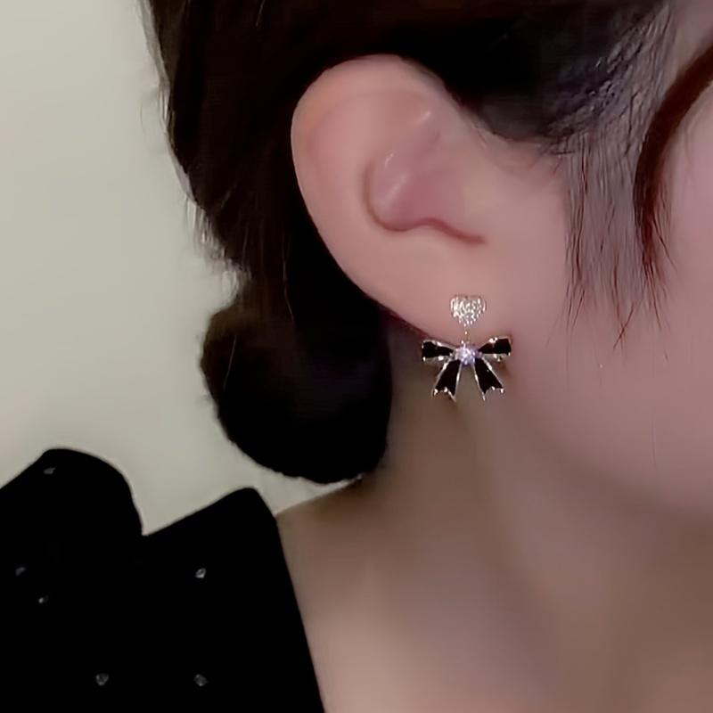 Product Introduction of Shiny Heart With Black Bow Pendant Stud Earrings Alloy Jewelry Embellished With Rhinestones Elegant Vintage Style Female Dating Earrings 0