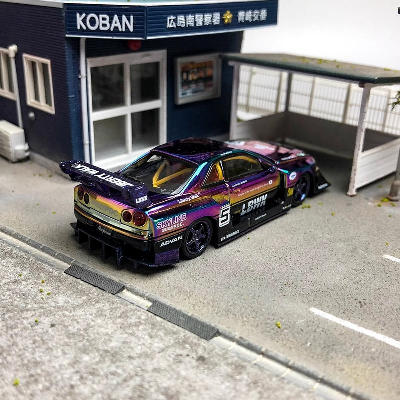 Product Introduction of CM Model 1 64 Nissan ER34 electroplated seven color delivery wheel hub alloy car model Alloy Diecast Car Model Collection 15