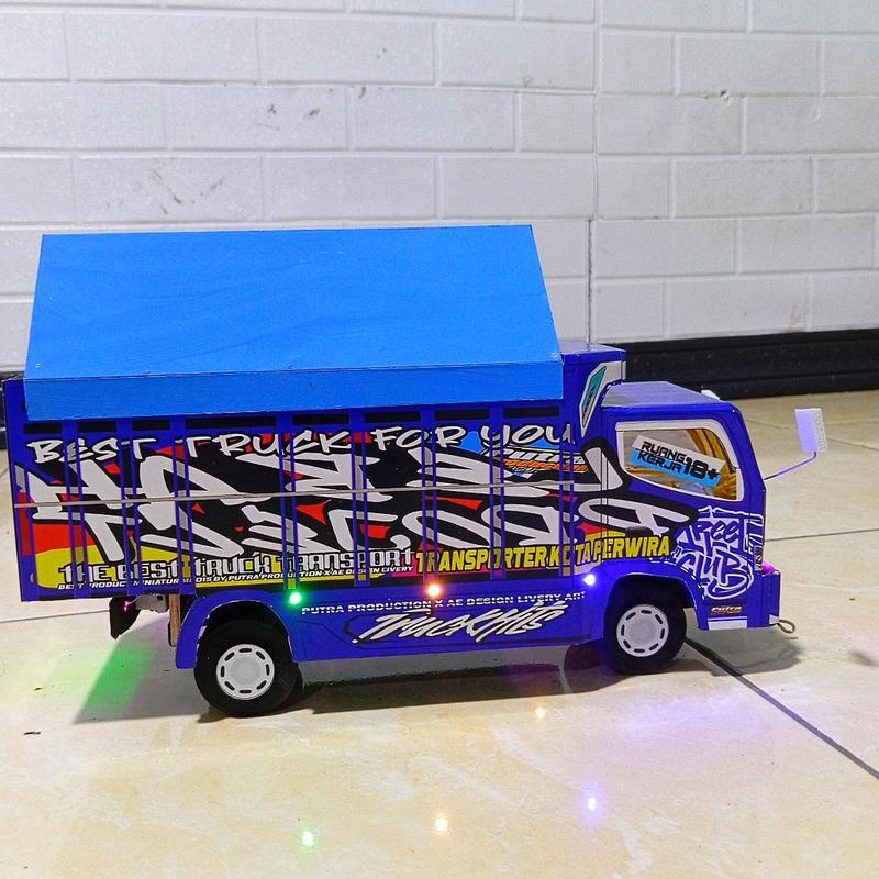 Product Introduction of MAINAN MINIATUR TRUK OLENG BISA TAMBAH NAMA DAN FOTO MINIATUR TRUK OLENG FULL VARISI LAMPU DAN TERPAL MAINAN TERLARIS 56