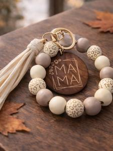 Llavero de mujer con cuentas y decoración de borlas en bloques de color, estilo boho, llavero de muñequera para mujeres y hombres, accesorios personalizados y lindos para regalo de cumpleaños