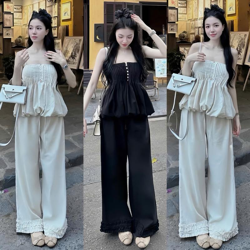 Set đồ nữ áo 2 dây babydol phối nút xếp ly kèm quần dài ống rộng chân bèo xinh xắn dành cho các nàng diện đi chơi.