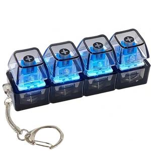 1 pieza de juguete fidget de teclado, llavero fidget de teclado 4 en 1 con botones para descompresión y clickers de dedos, regalos de fidget antiestrés con botones para aliviar el estrés (color transparente/negro)