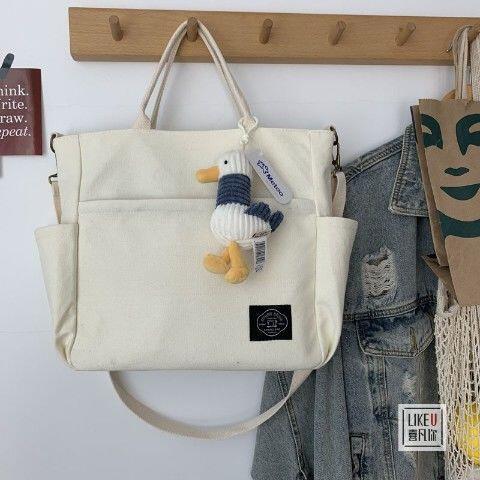 Product Introduction of New Arrival Canvas Tote Handbag Simple Large capacity single shoulder Bag messenger bag for men and women 18