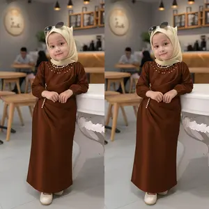 Aurel Gamis Kondangan Anak Special Burgundy dengan Detail Mutiara dan Lengan Puff Style untuk Tampilan Elegan Bahan Satin Lembut & Dingin Cocok untuk Lebaran dan Acara Sekolah