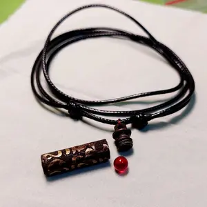 Kalung batu merah delima tabung kuningan kaligrafi / liontin lipan merah