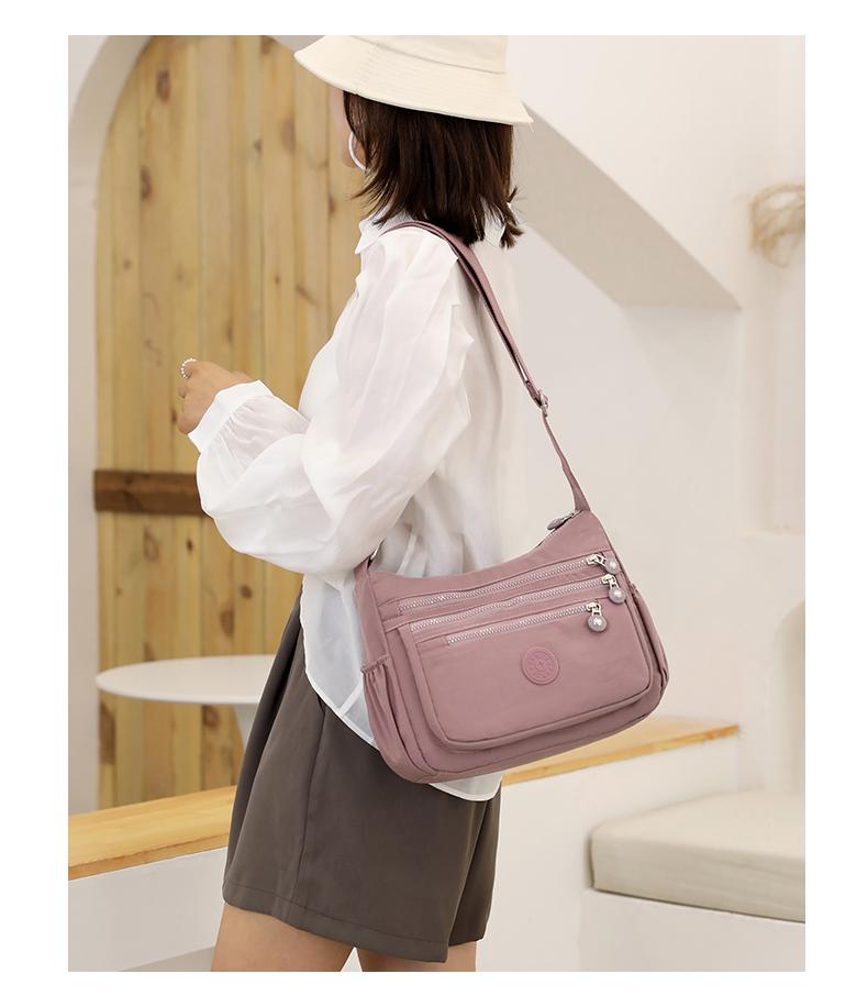 Product Introduction of Túi Đeo Chéo Nylon Chống Thấm Nước Cho Nữ, Túi Du Lịch Sức Chứa Lớn Có Khóa Kéo Nhiều Lớp Cho Bé Gái, Túi Đưa Thư Đựng Đồ Giải Trí Ngoài Trời Đeo Vai 15