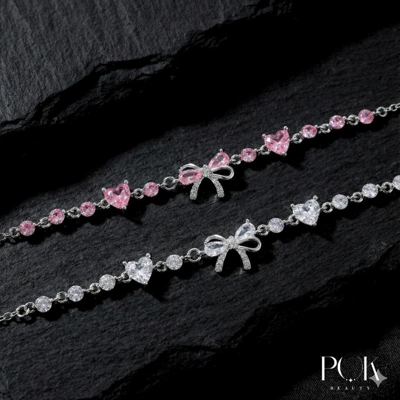  Vòng Tay Nữ Thiết Kế Tinh Tế Phong Cách Ngọt Ngào Tinh Tế Với Trái Tim Nơ Hồng Được Làm Bằng Thép Titan Không Gỉ Không Phai Màu Chất Lượng Cao Thích Hợp Làm Quà Tặng Cho Bạn Gái Phụ Kiện Tay Hợp Thời Trang Dành Cho Các Cô Gái 