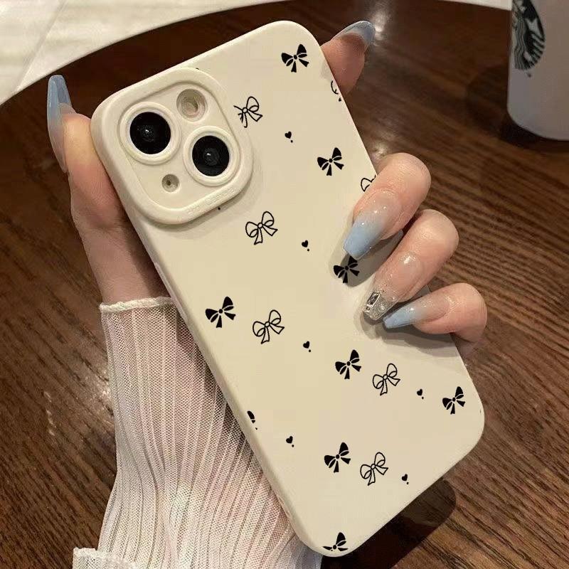 Nơ đen in rải rác phù hợp với iPhone18/17/16/15 vỏ điện thoại 14/13/11/7/17pro/17promax thiết kế tối giản 16 độc đáo 16plus mẫu mới 16pro