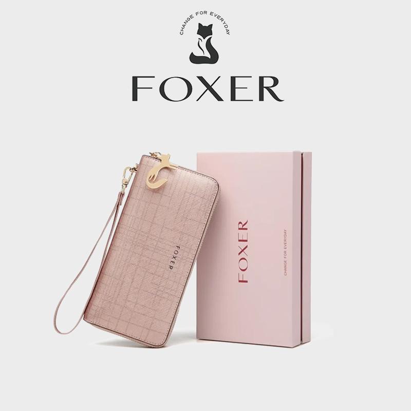 FOXER กระเป๋าเงิน แบบซิป หนังแท้คุณภาพสูง มีการออกแบบช่องใส่บัตรมากมาย สไตล์มินิมอลและทันสมัย