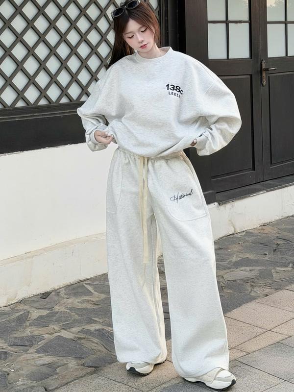  LEEZA - Quần Dài Ống Rộng Nam Nữ Vải 2Da Mix Chữ Thêu Có Túi Sau 15.01 