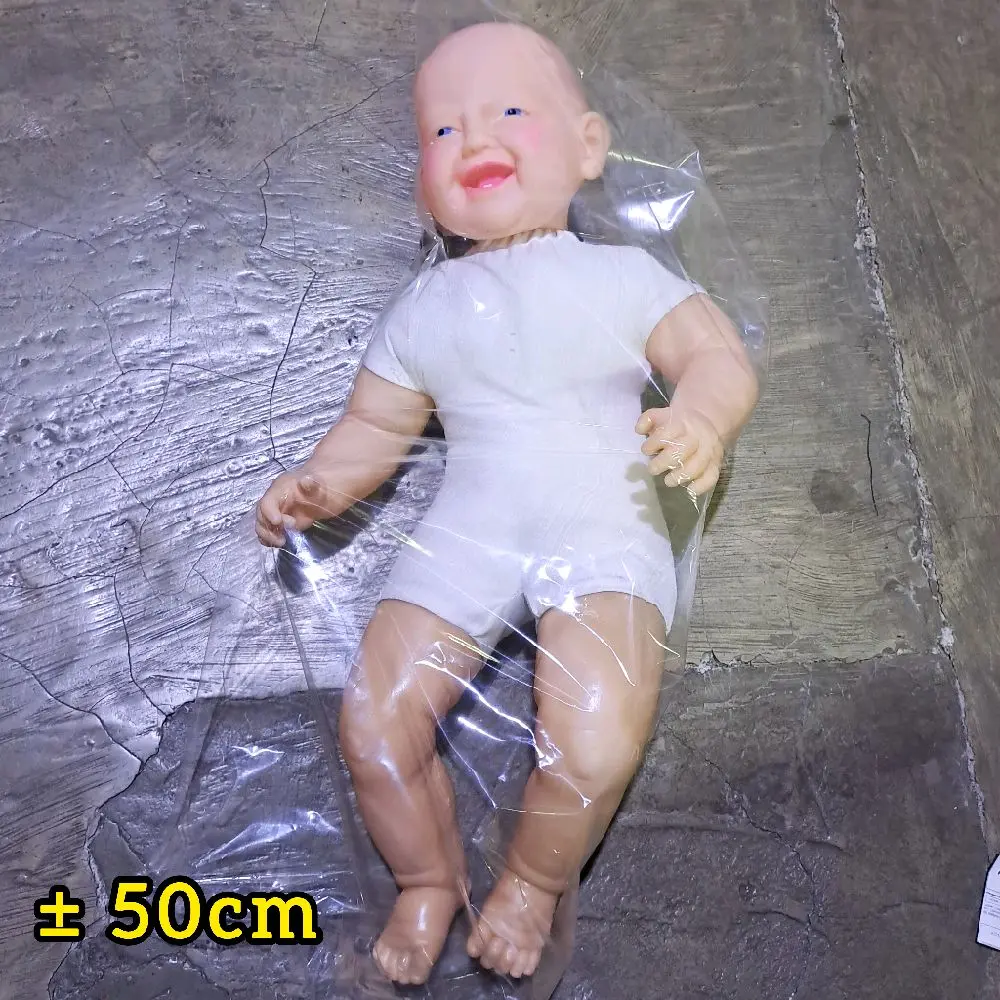 Boneka botak kaki tekuk bahan karet