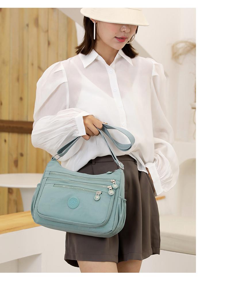 Product Introduction of Túi Đeo Chéo Nylon Chống Thấm Nước Cho Nữ, Túi Du Lịch Sức Chứa Lớn Có Khóa Kéo Nhiều Lớp Cho Bé Gái, Túi Đưa Thư Đựng Đồ Giải Trí Ngoài Trời Đeo Vai 20