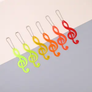 2Pcs Color Music Note PVC Reflective Pendant Kids Schoolbag Keychain Charm Night Running Cycling Luminous Warning Tag in Dark - Fluorescent green