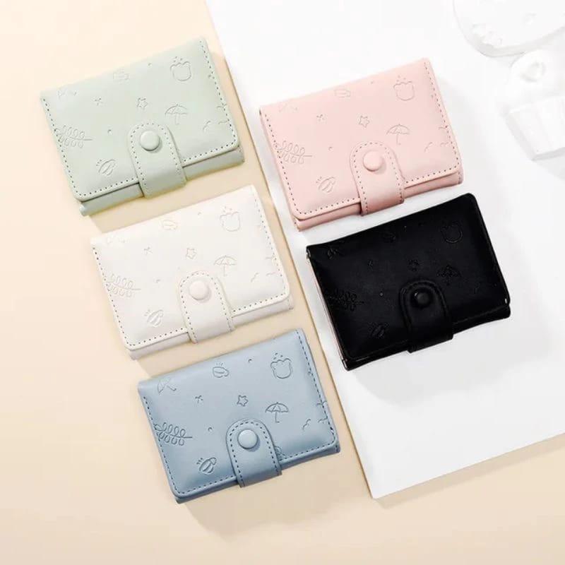 DW-27 Dompet lipat Wanita Mini Motif Embos 1