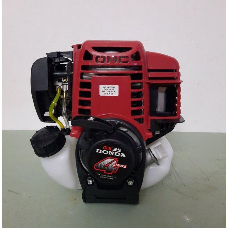 đầu máy cắt cỏ gx35 dùng để máy bơm nước , chế bình phun thuóc