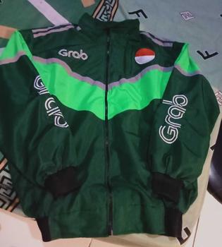 Product Review of Jaket  bomber Casual driver model terbaru Thailand poliester sporty minimalis krem/khaky Logo Bordir murah from t**y 1