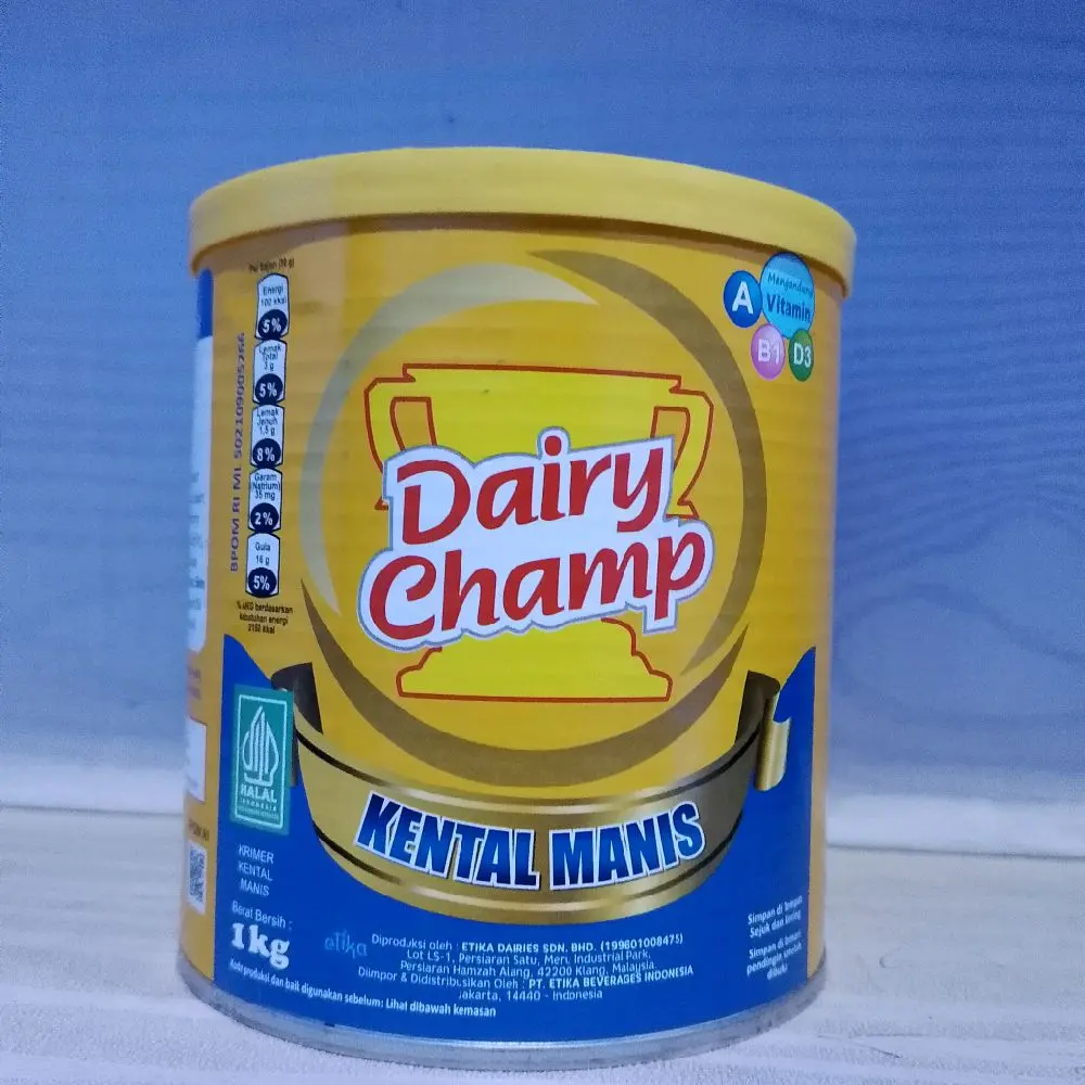 Susu Dairy Champ kaleng 1kg