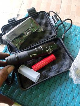 Product Review of Senter Super Terang Waterproof LED Rechargeable Baterai Tactical Anti Air Lampu SWAT Zoom Murah Free Charger from G**Y 3