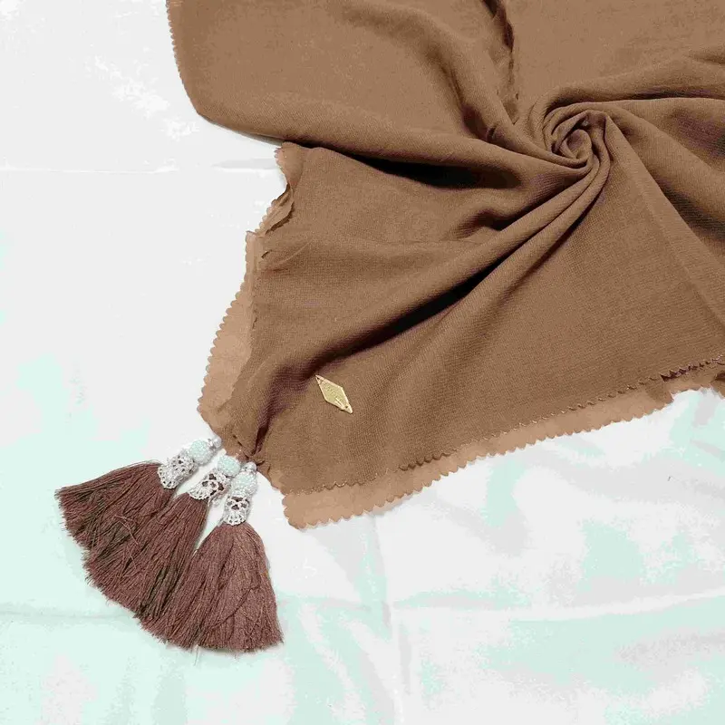 Hijab Segiempat Polos Jambul Tassel Bahan Waflle Rubicorn Lasercut 1