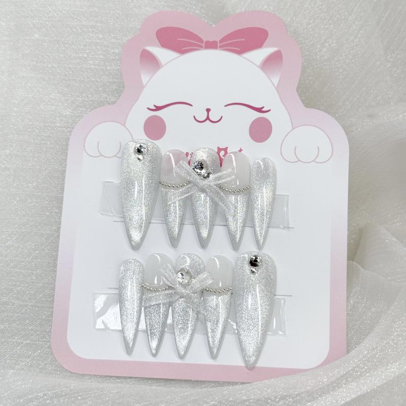 KimSu Nailbox thiết kế mắt mèo bạc đính nơ