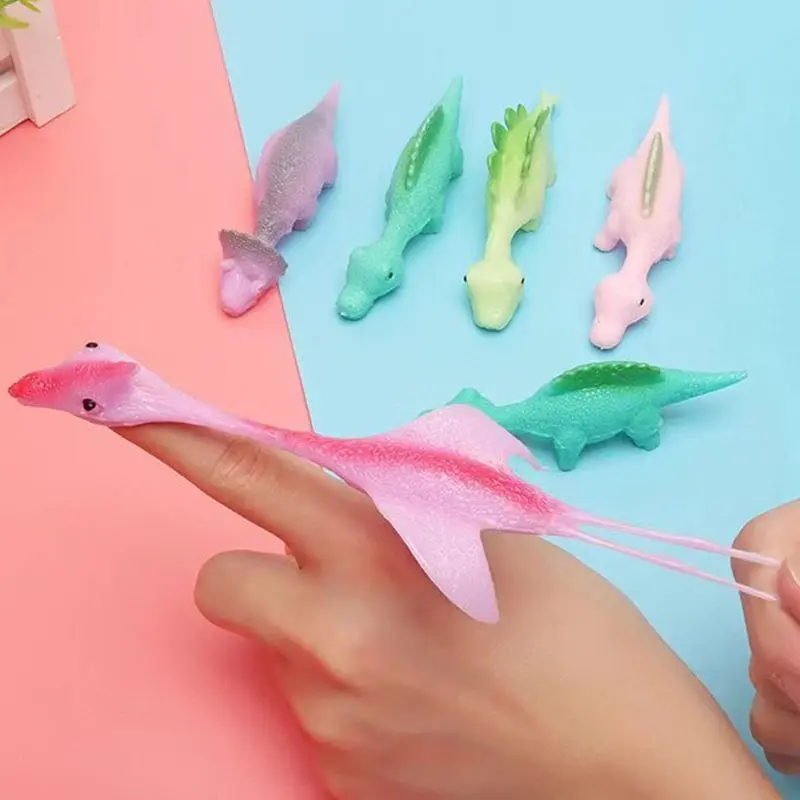 Slingshot Dinosaur Fun Toy Finger Dart Launching Little Dinosaur Decompression Softrubber 2