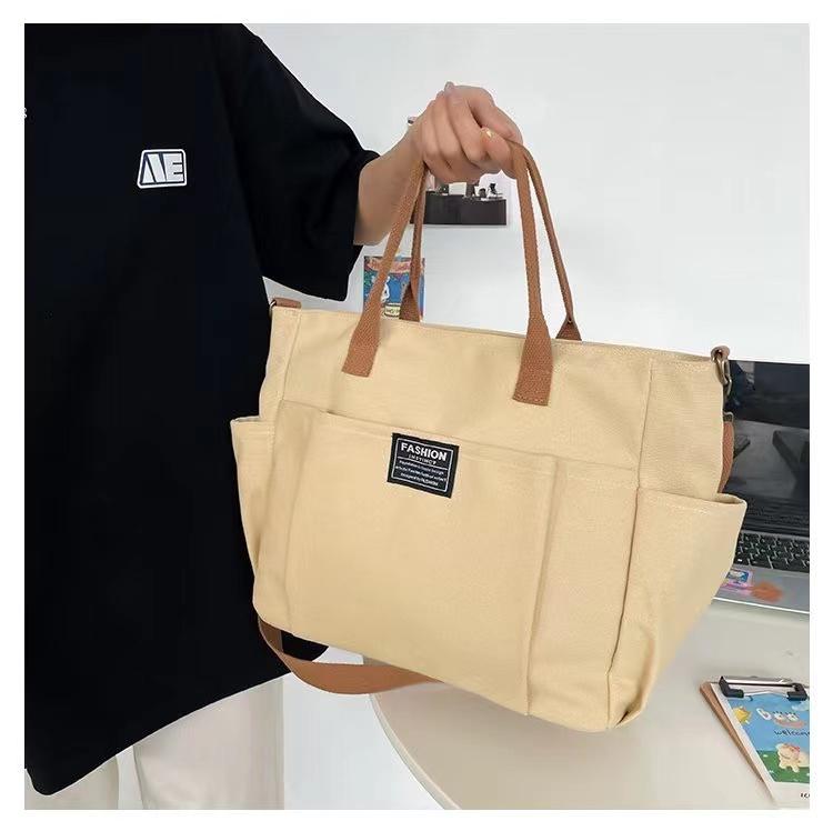 Product Introduction of Túi Vải Tote Nhật Bản, Dày Dặn, Nhiều Ngăn, Phong Cách Thường Ngày Thích Hợp Cho Học Sinh, Có Thể Mang Theo Bằng Tay Hoặc Đeo Một Bên Vai, Túi Đeo Chéo, Lý Tưởng Cho Trường Học, Thiết Kế Đơn Giản 10