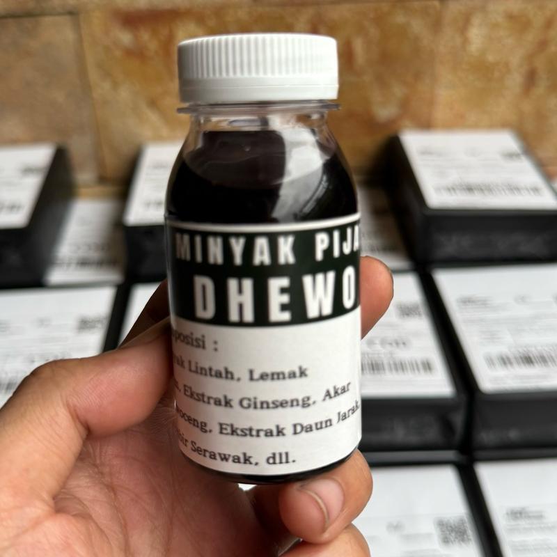MINYAK PIJAT TRADISIONAL MASSAGE OIL DHEWO 50ML 3