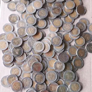 Uang koin Kuno Gambar kelapa sawit pecahan 1000rupiah