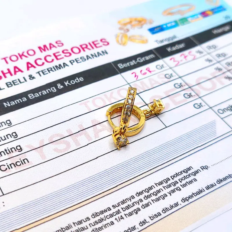 Anting wanita terlaris lapis emas muda 375 kadar ada surat dari toko 0