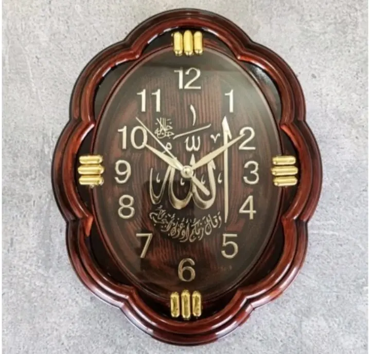 JAM DINDING NIKKO NUANSA ISALMI KALIGRAFI 8196 OVAL DIAMETER 21,5 X 18,5 CM