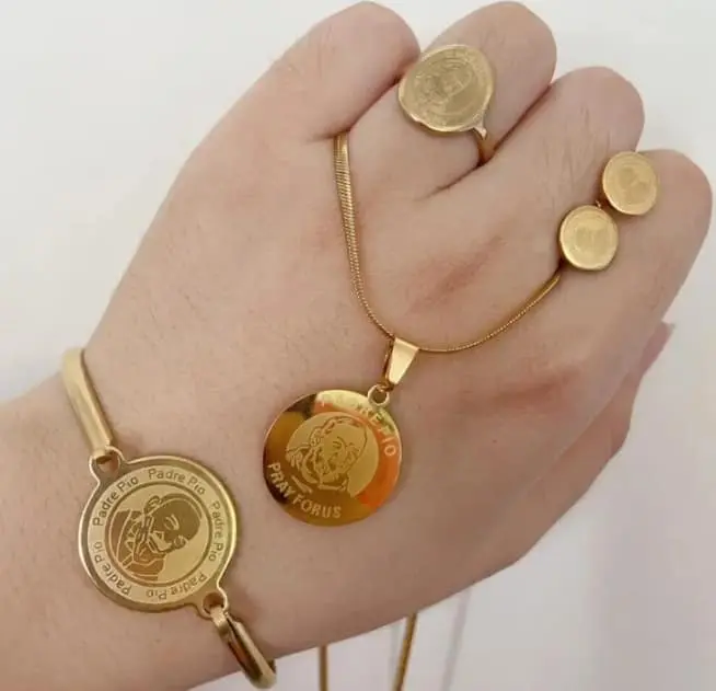 4 in 1 religious jewelry set, padre pio , saint benedict and mama mary design Non tarnish hypo allergenic