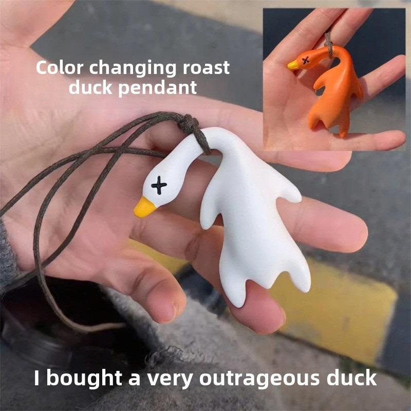 Product Introduction of Color-changing roast duck keychain & changes color when exposed to ultraviolet light, suitable for bag pendants and car pendants for decoration 0