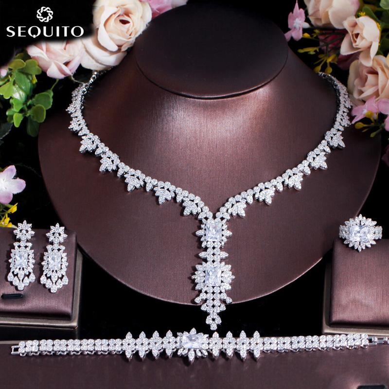 Bộ trang sức 4 món SEQUITO chất lượng cao mạ trắng đính đá CZ AAA hình kim cương gồm dây chuyền mặt dài bông tai nhẫn và vòng tay dành cho nữ phụ kiện váy cưới dự tiệc cổ chữ V sâu SJ243