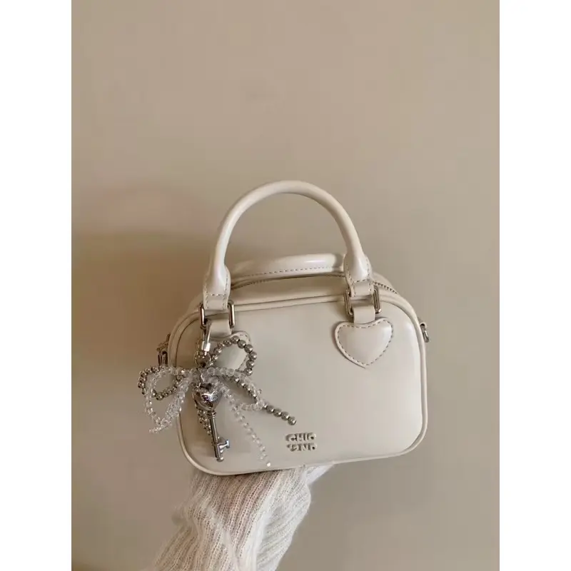 ￼Tas Slempang Chio Ribbon Top Handle