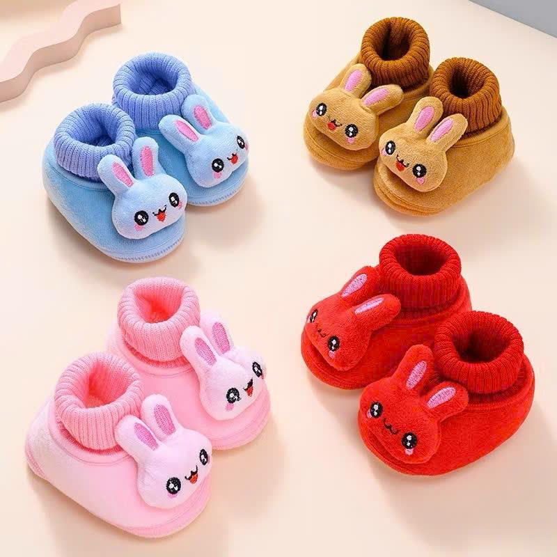 Giày Bông Cho Em Bé Tập Đi Có Dây Rút Hình Nơ Nhung Mềm Mịn Bảo Vệ Chân Bé 2 Màu Sắc Khác Nhau
