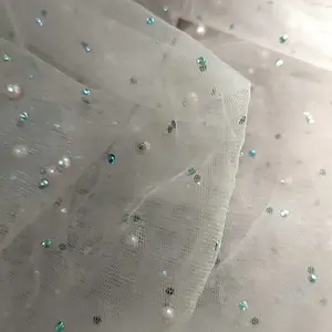 Kain Tile tulle Mutiara full stones/ kain tile tulle payet Mutiara
