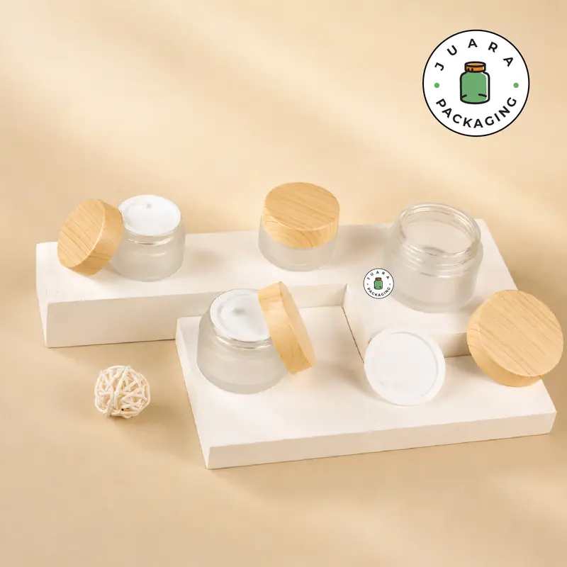 Pot Cream Kaca Buram 5gr 10gr 15gr 30gr 50gr 100gr Tutup PVC Aksen Kayu 5ml 10ml 15ml 30ml 50ml 100ml – Jar Kosmetik untuk Cream, Skincare, Moisturizer, Masker Wajah, Balm, Body Butter dan Produk Refill