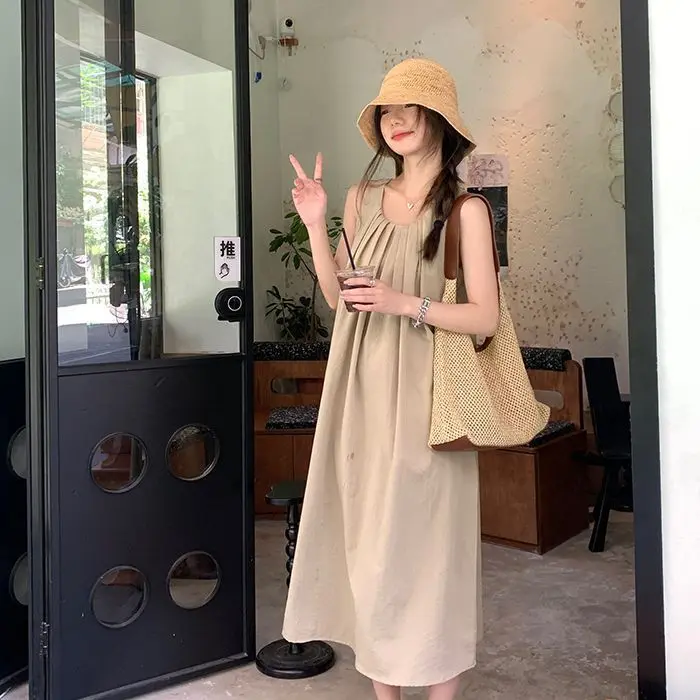 Sleeveless halter top dress, gentle summer Korean style, beach vacation dress, French pleated loose vest dress, hollowed out backless temperament maxi dress