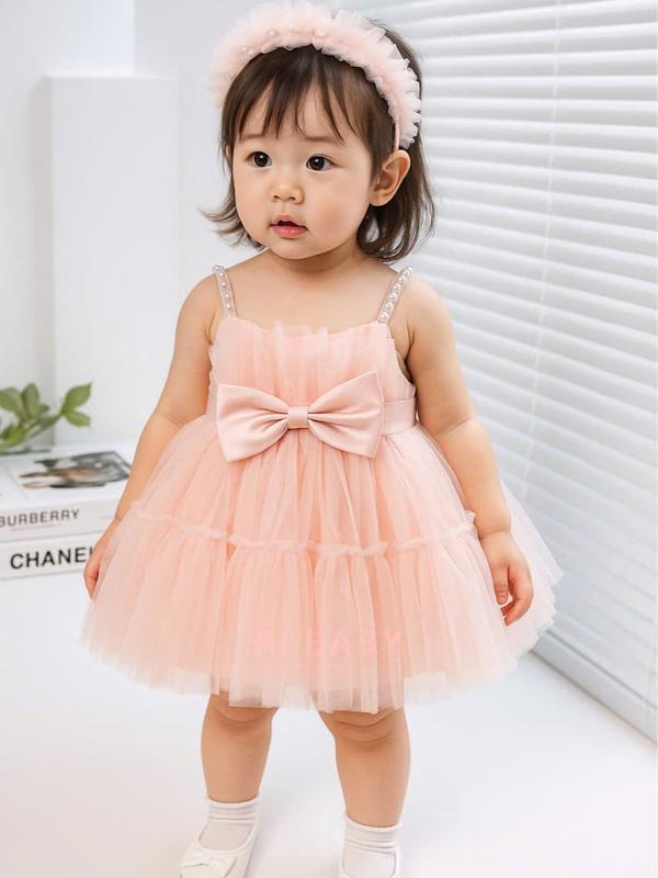 Đầm công chúa 2 dây bánh bèo nơ lưng kèm cài váy cô