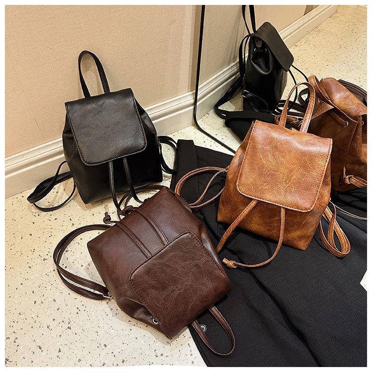 Product Introduction of Beg galas berbilang belakang coklat retro untuk wanita, beg bahu bertali, ringkas dan serba guna, gaya seni, baharu PU Leather Canvas Plain Floral Striped Polka Dot Black Brown Navy PU Leather Backpack Ransel Bags 18