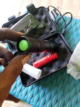 Product Review of Senter Super Terang Waterproof LED Rechargeable Baterai Tactical Anti Air Lampu SWAT Zoom Murah Free Charger from G**Y 2