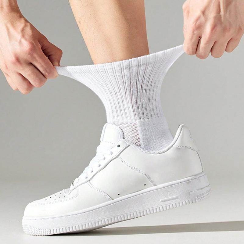Product Introduction of Solid color basketball ladies men's socks sports running towel bottom thickened black and white couples socks 1
