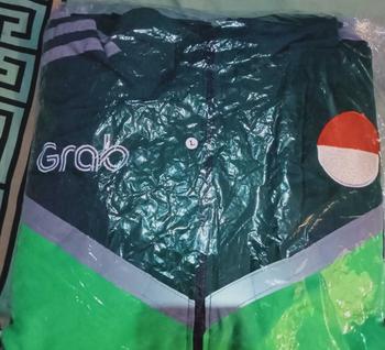Product Review of Jaket  bomber Casual driver model terbaru Thailand poliester sporty minimalis krem/khaky Logo Bordir murah from t**y 0