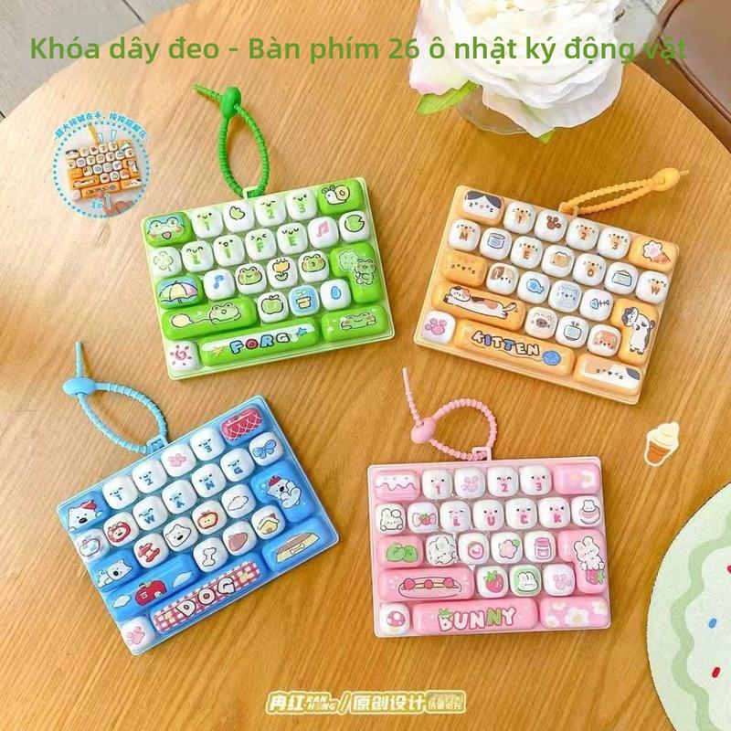 Đồ chơi bàn phím mini giảm stress phát sáng, kích thước nhỏ gọn, thiết kế hoạt hình, có móc khóa tiện lợi.